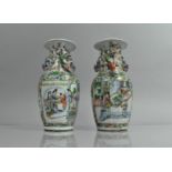 A pair of 19th Century Chinese Canton Vases of Baluster Form decorated in the Famille Verte