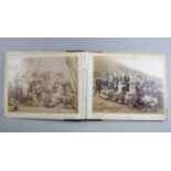 A Late 19th century Photo Album Containing Monochrome and Hand Coloured Photographs of People and