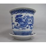 A Large Chinese Blue and White Planter and Stand, Decorated with Dragons and Phoenix, Total Height