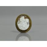 A Carved Shell Cameo Brooch in Gold Metal Mount (unstamped) Depicting Classical Maidens with Dove