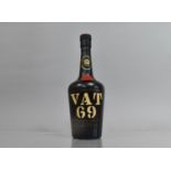 A Mid/Late 20th Century Novelty Advertising Cigarette Dispenser in the Form of a Bottle of VAT 69