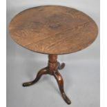 An 18th Century Tripod Table made of Mixed Country Timbers, The Top with the Remains of an Inlaid