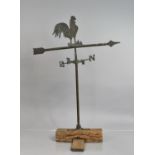 A Early 20th Century Brass Weathervane with a Cockerel Mounted Arrow Over Four Points of the