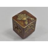 A Japanese Meiji Period Pill Box of Square Form decorated with Applied Decoration, 3cms High