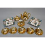 A Collection of Various Continental Ceramics To German Gilt Coffee Set, Two Porcelain Square