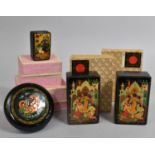 A Collection of Four Russian Lacquered Boxes with Fairy Tale Decoration to Lids