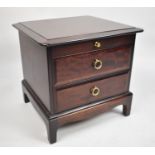 A Stag Mahogany Two Drawer Bedside Chest with Slide, 53cm wide