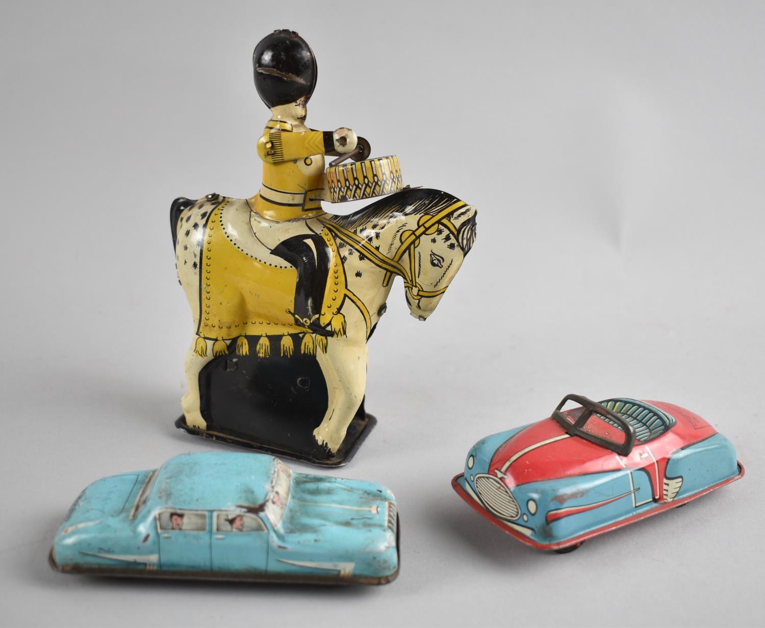 A Collection of Three Vintage Tin Plate Clockwork and Friction Toys, Untested