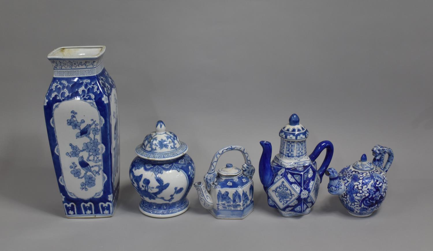 A Collection of Modern Oriental Blue and White to Comprise Large Vase, Teapots and Temple Jar and