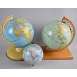 Three Mid 20th Century Tin Plate Children's Globes, 18cm high