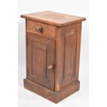 An Edwardian Mahogany Bedside Cabinet with SIngle Drawer over Panelled Door to Cupboard Base,