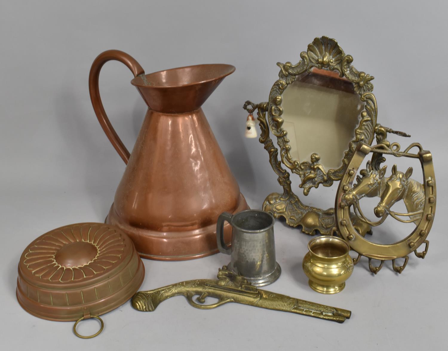 A Collection of Various Metalwares to Comprise Large Copper Jug, Jelly Mould, Brass Dressing Table