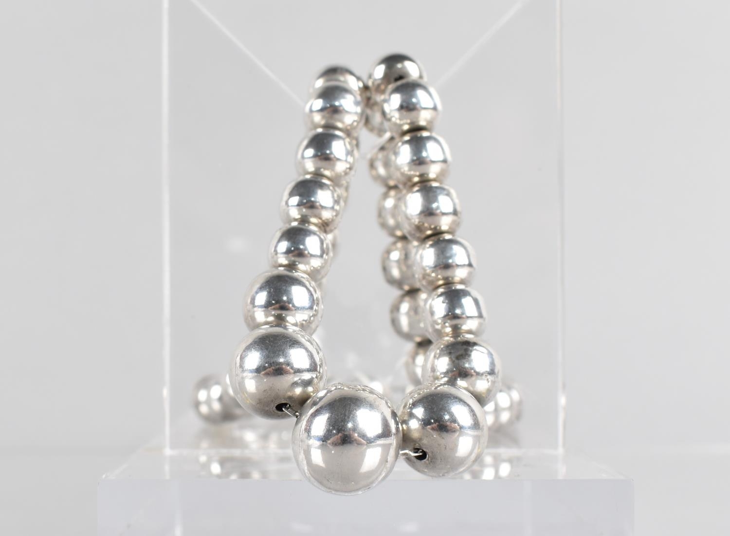 A Graduated Silver Bead on Trace Chain Necklace, Compressed Spheres 8mm by 10mm to 16mm by 12mm,