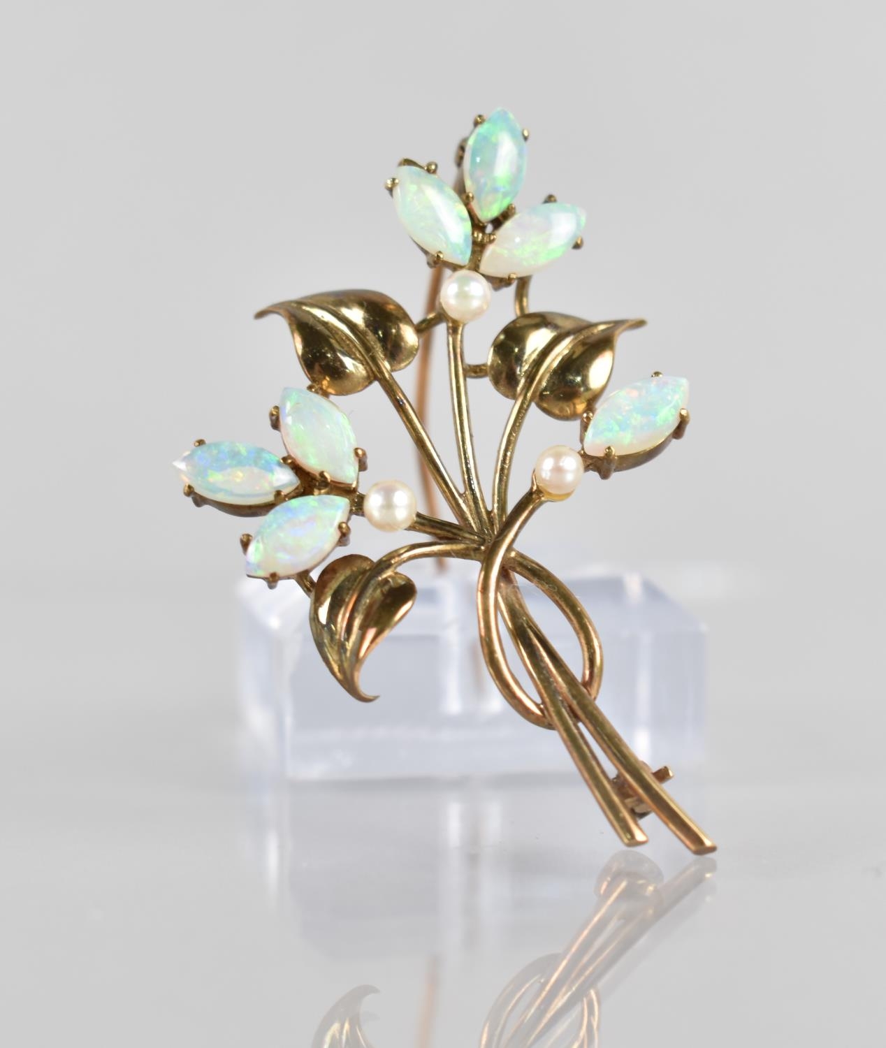 A 9ct Gold, Opal and Pearl Brooch in the Form of a Spray of Flowers and Leaves, 53mm Long, 6.9gms,