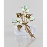 A 9ct Gold, Opal and Pearl Brooch in the Form of a Spray of Flowers and Leaves, 53mm Long, 6.9gms,