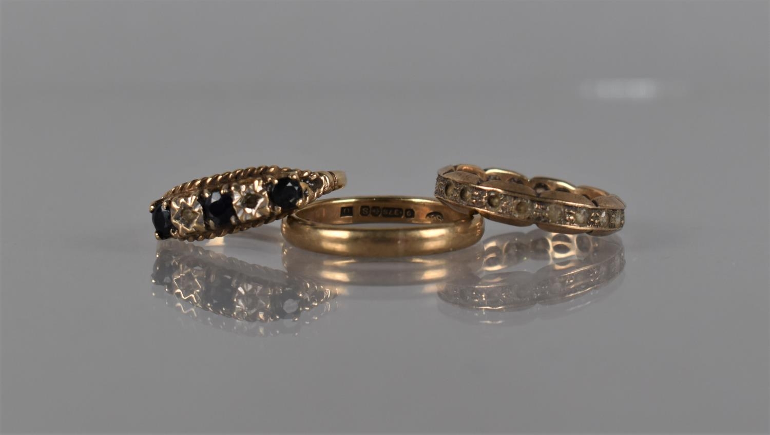 A Collection of Early to Mid 20th Century 9ct Gold Rings to include a Plain Polished Wedding Band,