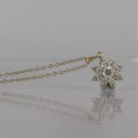 A 9ct Gold Starburst Cluster Pendant on Chain, Comprising 17 Round Brilliant Cut Claw Mounted