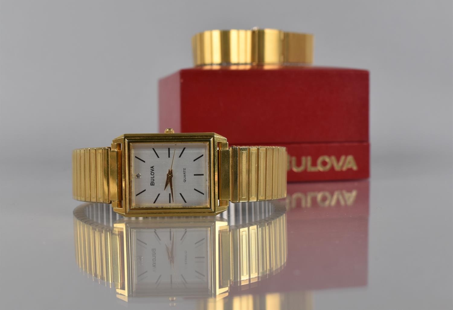 A Cased Vintage Gents Bulova Wrist Watch, Silvered Dial with Gold Hands, Black Baton Hour Markers