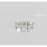 An 18ct Gold, Diamond and Platinum Trilogy Ring, Centre Round Brilliant Cut Diamond Approx 0.513ct
