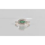 A Late 19th/Early 20th Century Diamond and Emerald Panel Ring, Central Graduated Square Cut Emeralds