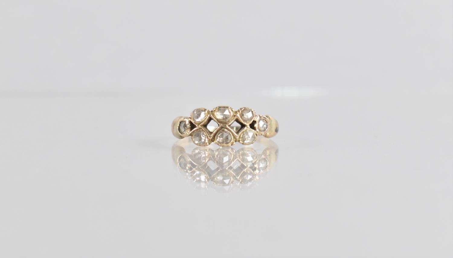 An Antique Diamond Dress Ring Having Eight Round/Oval Rose Cut Diamonds, Roughly 2mm