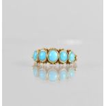 An Eastern Turquoise and Gold Coloured Metal Ladies Dress Ring, Five Graduated Oval Cabochon