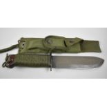 An American Heavy Multipurpose Knife with Canvas Sheath Incorporating Sharpening Stone