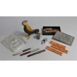 A Collection of Curios to Include Pencil Leads, Coins, Cold Painted Cockerel Box, Whistle etc