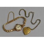 A Heart Shaped Locket having Gold Front and Back together with a Gold Coloured Metal Cased Wrist
