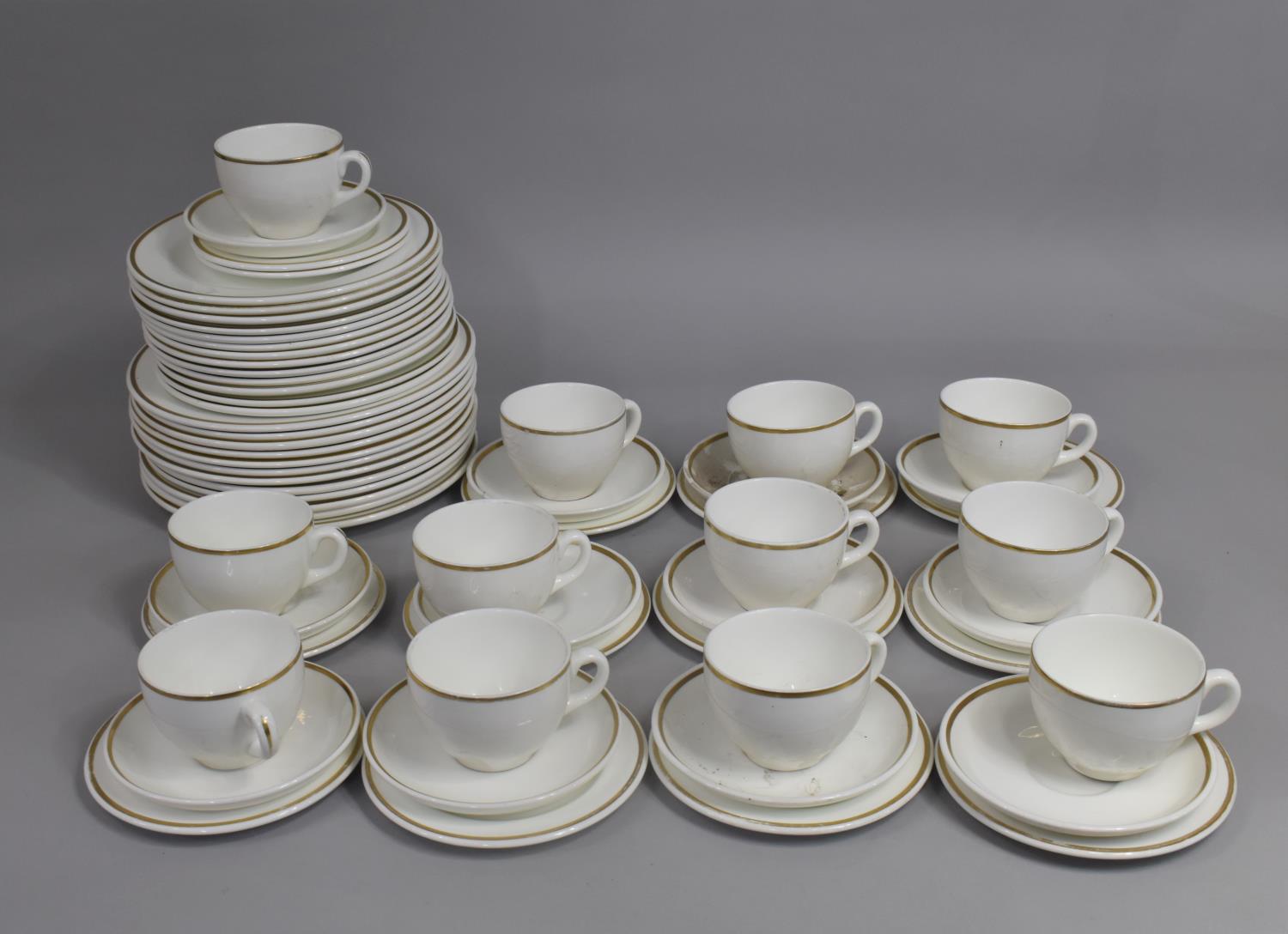 A Wedgwood Gilt Trim and White Service to comprise Dinner Plates, Saucers, Side Plates, Cups Etc
