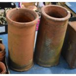 A Pair of Cylindrical Terracotta Chimney Pots, 59cms High