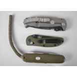 A Collection of American and Other Pocket Knives to include Hostile Environment Survival Tool RYPD2,