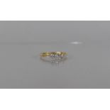 An 18ct Gold and Platinum Diamond Trilogy Diamond Ring, Centre Old Cut Diamond Approx 0.25ct in a