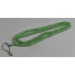 A Green Jadeite Bead Necklace