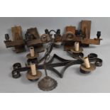 A Wrought Iron Four Branch Candelabra together with a Set of Four Wooden Wall Sconce Lights