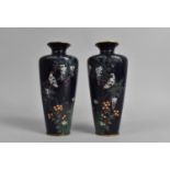 A Pair of Japanese Cloisonne Vases Decorated with Birds in Blossoming Branches on a Midnight Blue