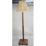 An Art Deco Oak Standard Lamp, Shade AF