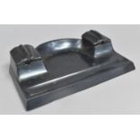 A German Patinated Metal Desktop Ink Stand with Two Ink Wells having Hinged Lids, 24.5cms Wide