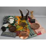 A Collection of Various Souvenir Items to include African Bust, Textiles, Cow Bell Etc