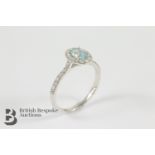 Platinum Set Aquamarine and Diamond Cluster Ring