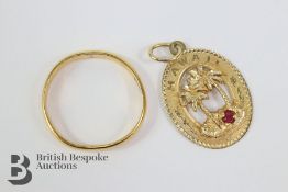 22ct Gold Ring and 14ct Gold Pendant