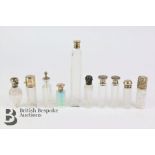 Ten Edwardian and Victorian Silver Topped Scent Bottles