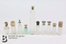 Ten Edwardian and Victorian Silver Topped Scent Bottles