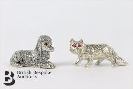 Two Silver Figurines