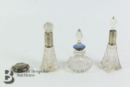 Three Cut-Glass Scent Bottles
