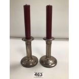 PAIR OF COLUMN SHAPED HALLMARKED SILVER WEIGHTED CANDLESTICKS, 332 GRAMS