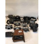 COLLECTION OF MIXED VINTAGE CAMERAS. INCLUDES NIKON, PENTAX, CANON, AND MORE.