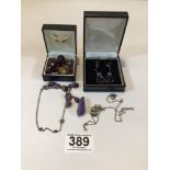 MIXED JEWELLERY INCLUDES AMETHYST BROOCHES, EARRINGS AND PENDANTS