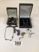 MIXED JEWELLERY INCLUDES AMETHYST BROOCHES, EARRINGS AND PENDANTS