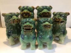 THREE VINTAGE PAIRS OF CHINESE CERAMIC TEMPLE GUARDIAN FU DOGS LARGEST BEING 20CM X 25CM.